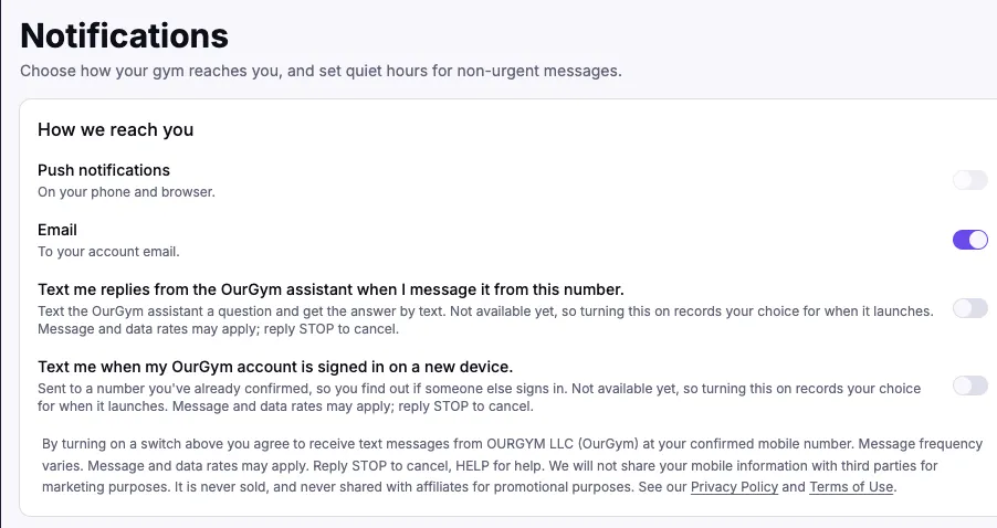 The Notifications page in the OurGym staff app, showing the "How we reach you" card. Four rows: Push notifications (off), Email (on), "Text me replies from the OurGym assistant when I message it from this number." (off), and "Text me when my OurGym account is signed in on a new device." (off). Each text row notes that the feature is not available yet, that message and data rates may apply, and that you can reply STOP to cancel.